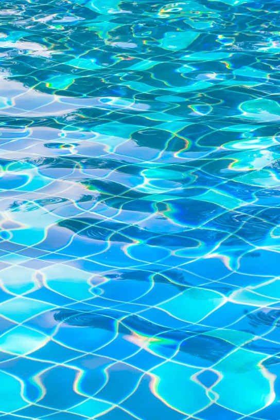 Background of blue rippled water in swimming pool (swimming, pool, wave)