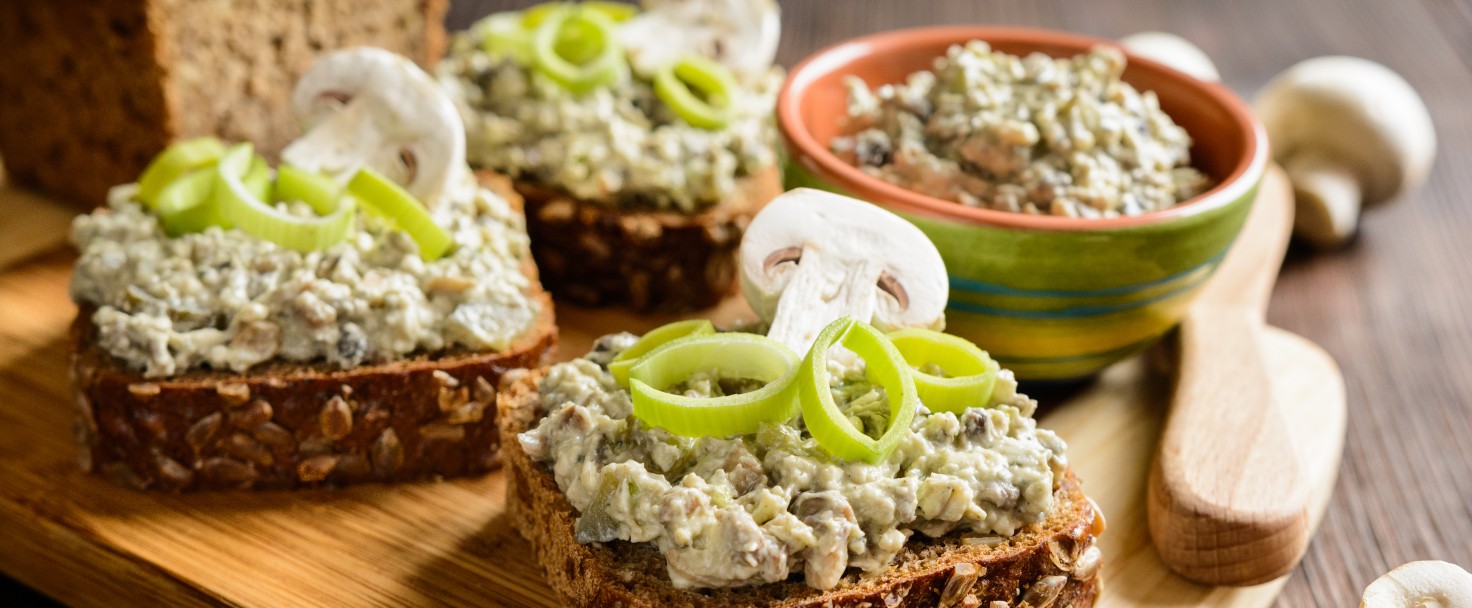 Slice of whole wheat toast with mushroom spread with Roquefort cheese and leek