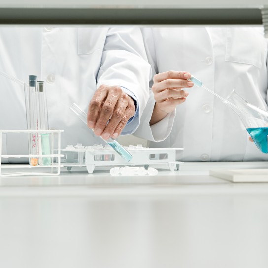 Scientists conducting an experiment