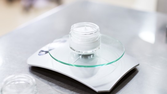 Healthcare creme production in laboratory. Creme products in lab. Healthcare industry.