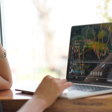 Businesswomanchecking stock market data