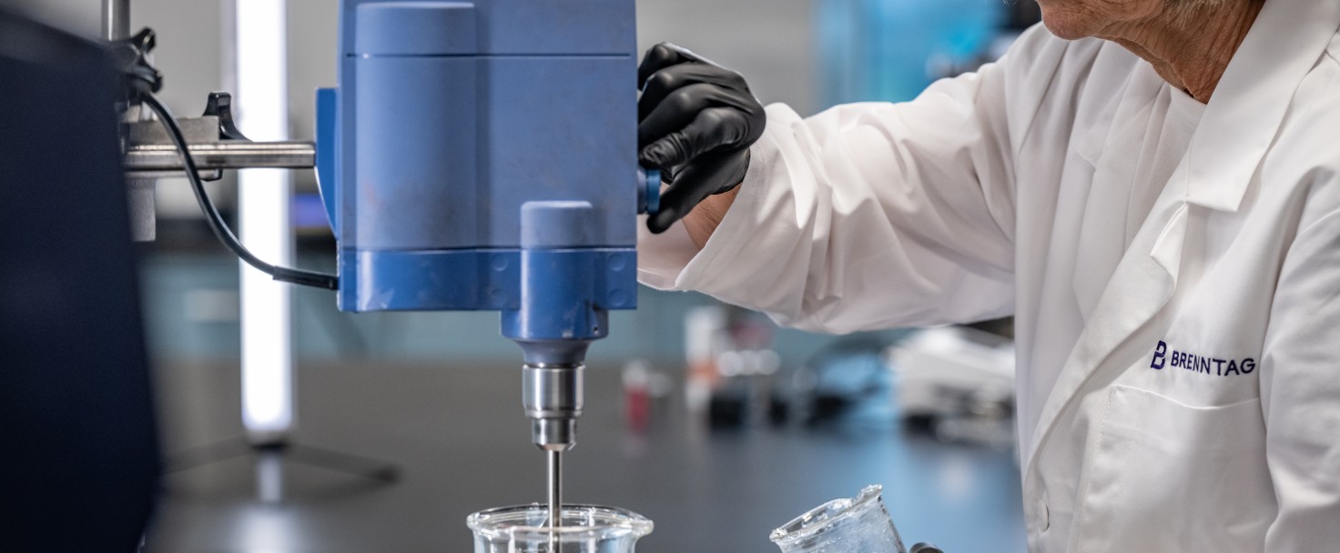 Brenntag Personal Care expert mixing the ingredients of the new formulation of a customer's product, Allentown, USA