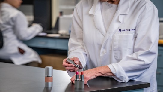 Brenntag Personal Care expert testing the texture of a lipstick, Allentown, USA