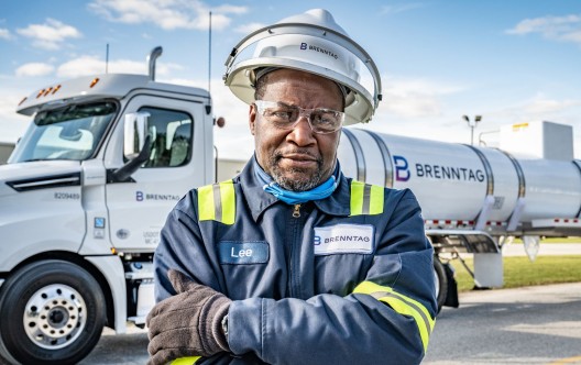 Brenntag truck driver standing in front of the truck, Houston, USA