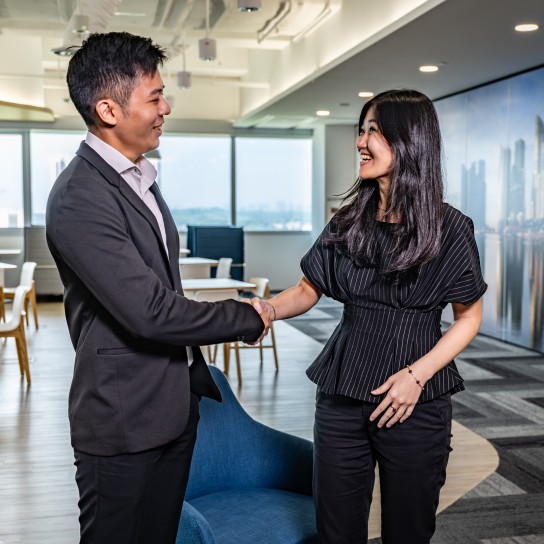 Brenntag colleagues greeting each other in the meeting area, Singapore