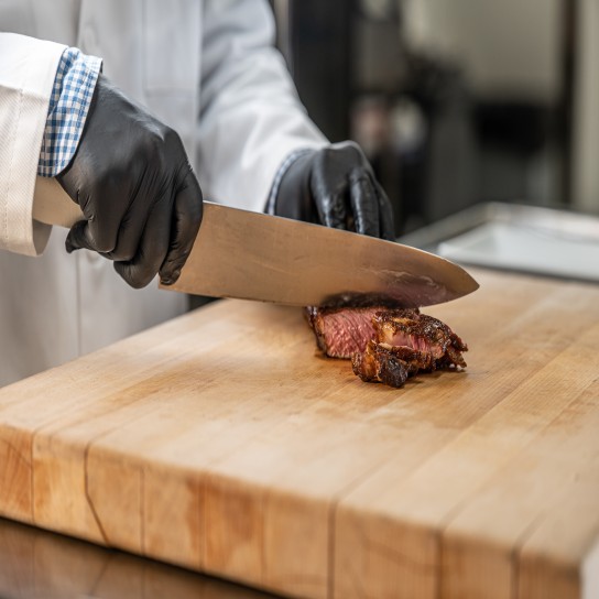 Slicing the steak in the application kitchen, Allentown, USA