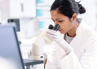 young female  scientist experimented in the laboratory