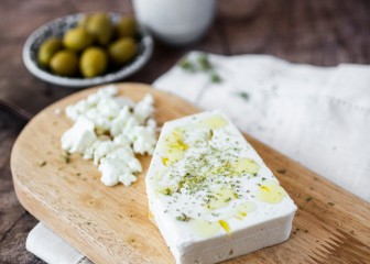 Feta cheese on cutting board