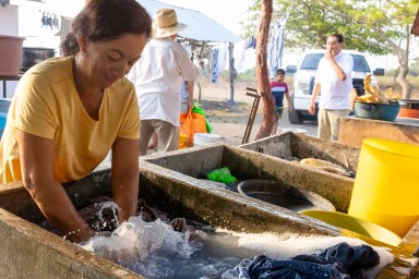 Family woman washing clothes