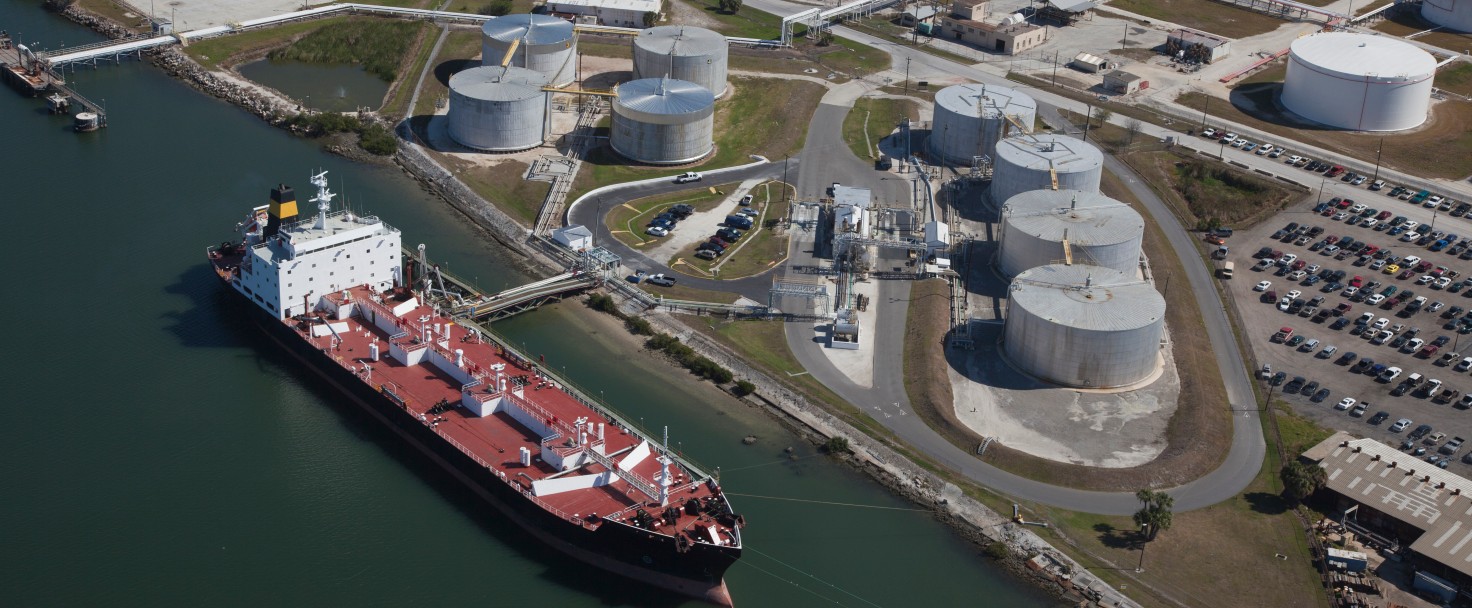 Crude oil tanker discharging crude oil to storage tanks