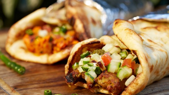 Indian Tandoori chicken wrap and lamb kebab on food truck