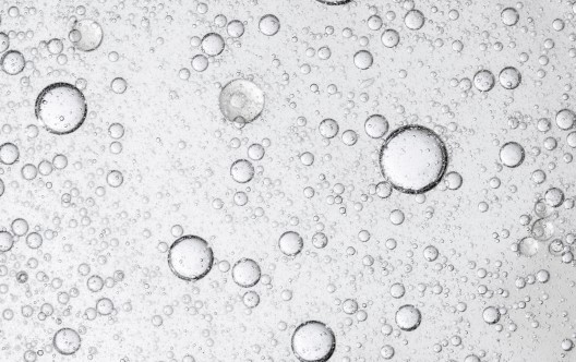 Close up of bubles in a translucent liquid