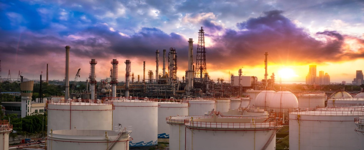 Oil and gas industry - refinery factory - petrochemical plant at sunset