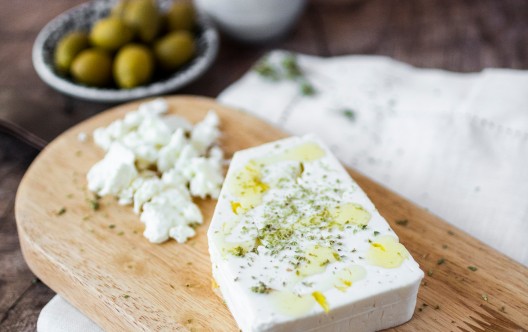 Feta cheese on cutting board