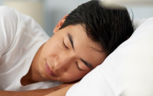 Cropped shot of a handsome young man sleeping in his bed in the morning
GettyImages-1155375319.jpg