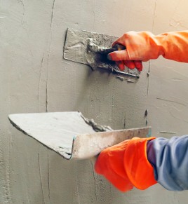 Hand image worker Concrete plaster
