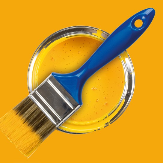 Yellow paint can with brush