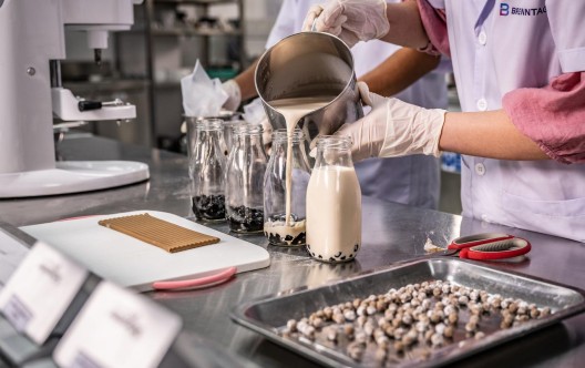 Milk poured into bottles