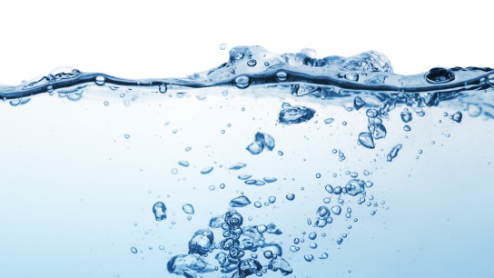 Water surface with ripple and bubble