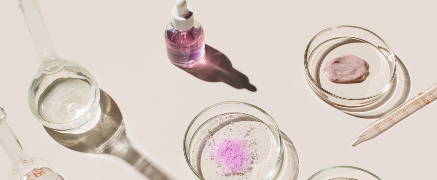 Laboratory glassware and cosmetic glass bottles on beige background. Natural medicine, cosmetic research, bio science, organic skin care products. Top view, flat lay. Research and development Concept.
GettyImages-1388434434.jpg
