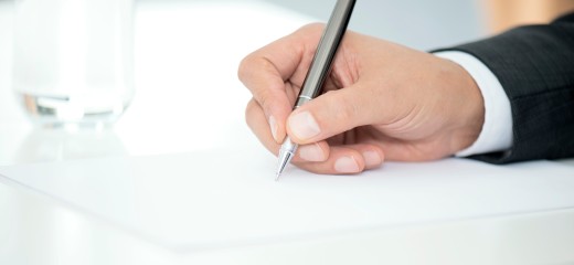 Man Signing Contract Paper