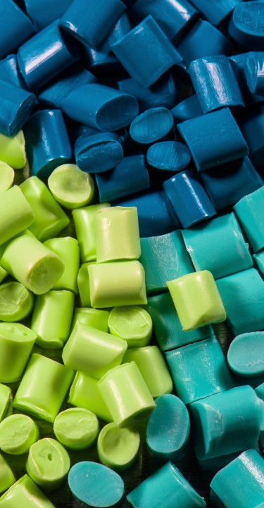 colored plastic polymer resins on black