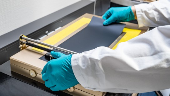 Brenntag employee checking the test in the coatings and construction application center in Duisburg, Germany