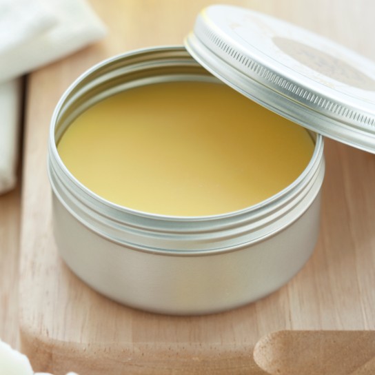 beeswax on a wooden background