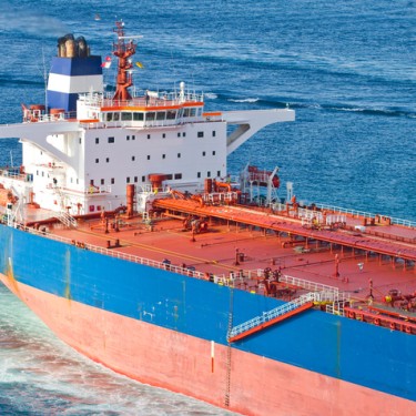 Tugboat in tropical blue ocean water