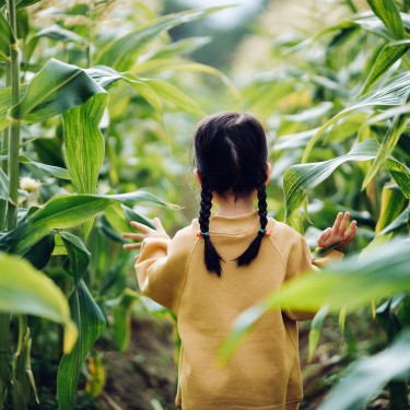  Little girl holding planet