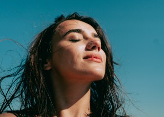 Self-portrait photo of a young woman at the beach.
GettyImages-1450268558.jpg