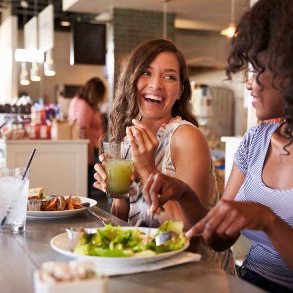 Two Women Enjoying Lunch Date In Delicatessen Restaurant
GettyImages-638005184.jpg