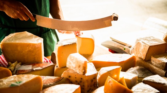Various organs, hard cheeses being sold on a market stall in Ireland