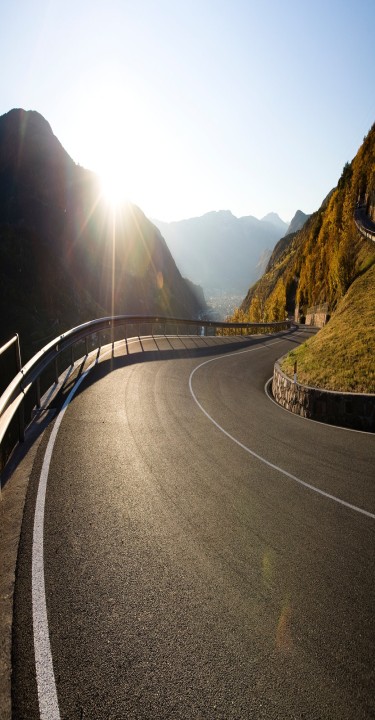 Mountain road with fresh layer of asphalt